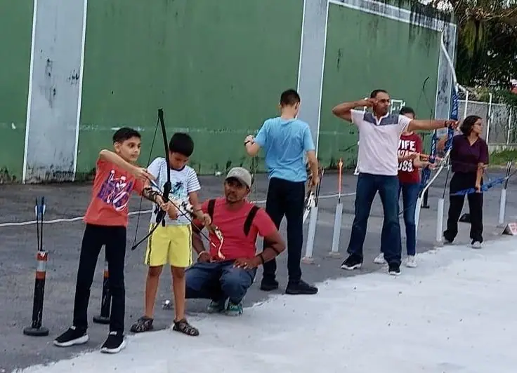 Children and adults training at the National Racquet Centre, 2022